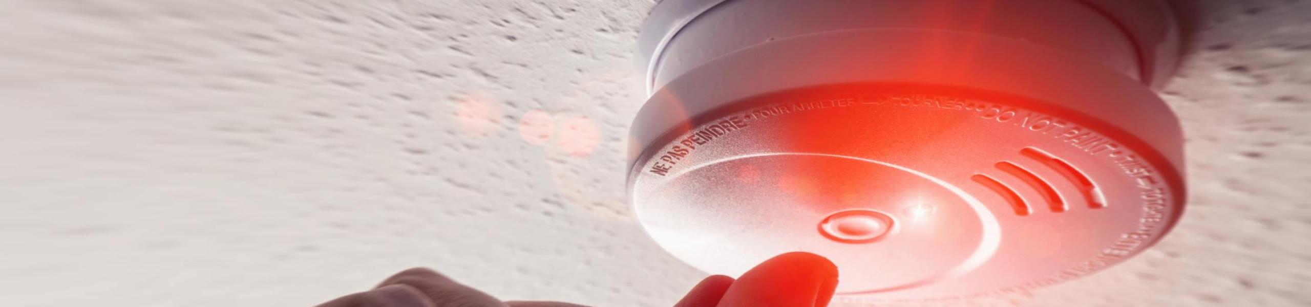 image of a smoke detector being tested